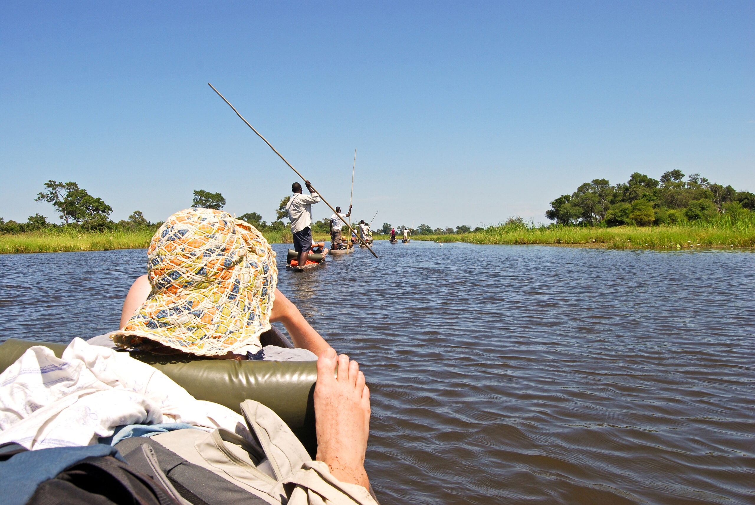 Canoe,Trip,With,Traditional,Mokoro,Boat,On,The,River,Through